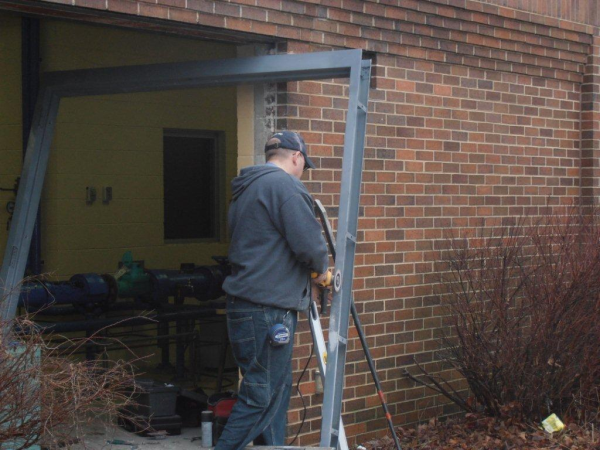 how to install commercial steel door frames